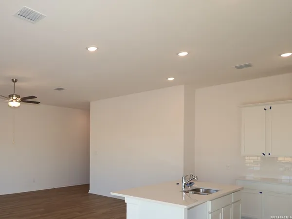 a view of a kitchen with a sink and dishwasher