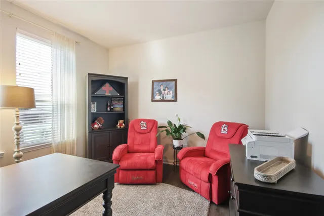 a room with furniture and a window