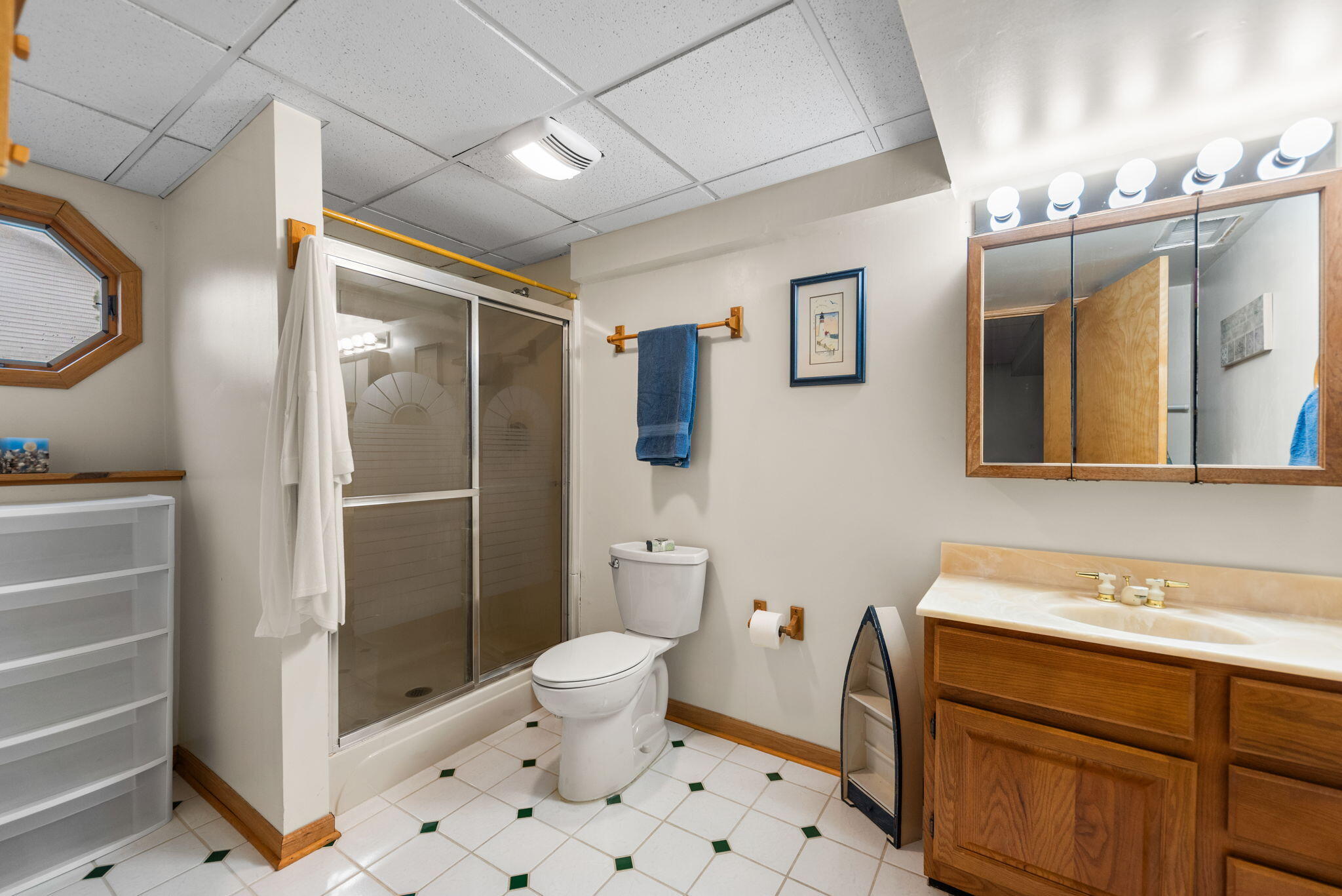 902 Aspen Street Hebron, IN 46341 - Photo 13 of 20 a bathroom with a sink toilet and shower