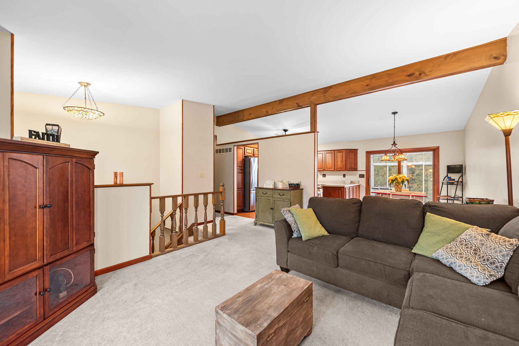 902 Aspen Street Hebron, IN 46341 - Photo 4 of 20 a living room with furniture a ceiling fan and a rug