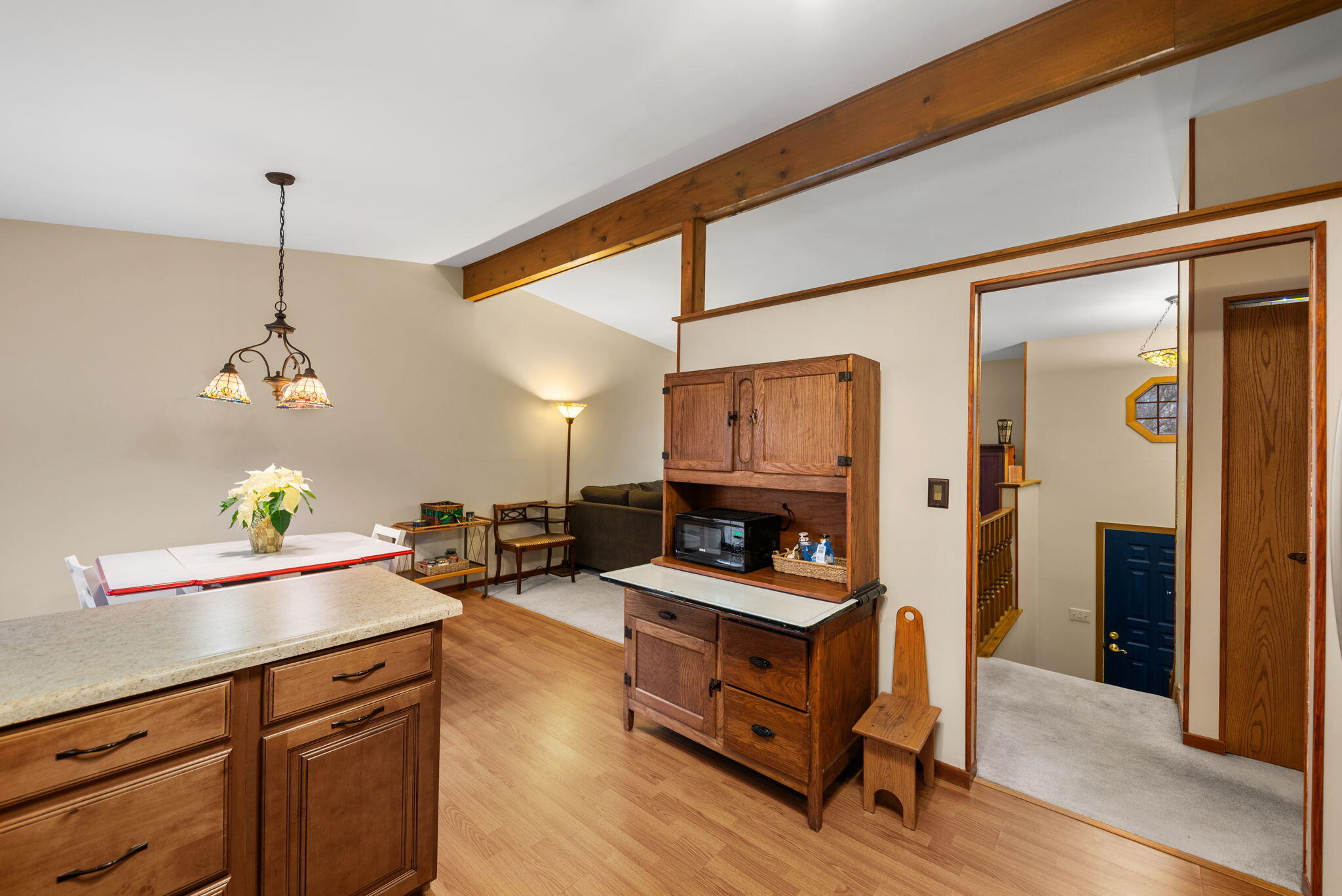902 Aspen Street Hebron, IN 46341 - Photo 6 of 20 a kitchen with sink refrigerator and stove