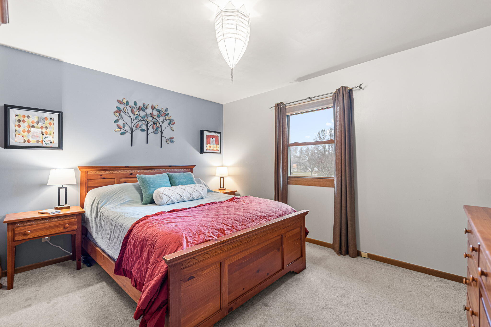 902 Aspen Street Hebron, IN 46341 - Photo 9 of 20 a bed sitting in a bedroom next to a window