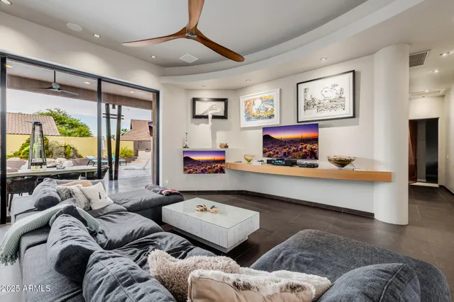 a spacious bathroom with a double vanity sink and a mirror
