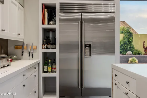a white toilet sitting next to a bath tub shower