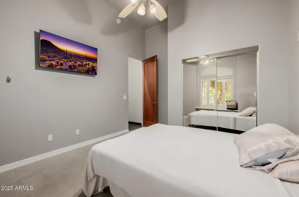 a view of a bathroom with a glass door and shower