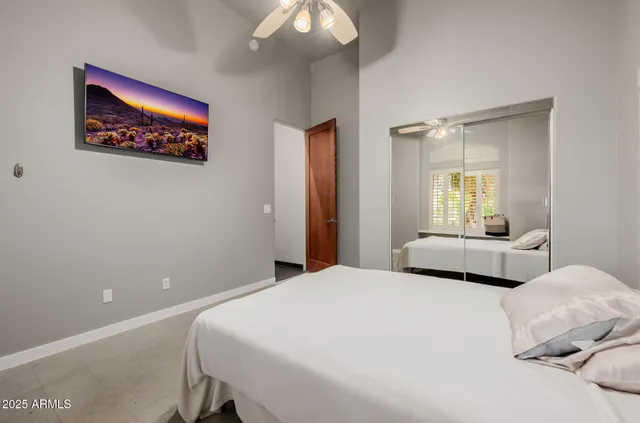 a view of a bathroom with a glass door and shower