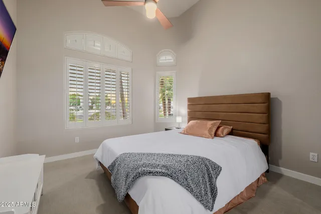 a view of a patio with table and chairs