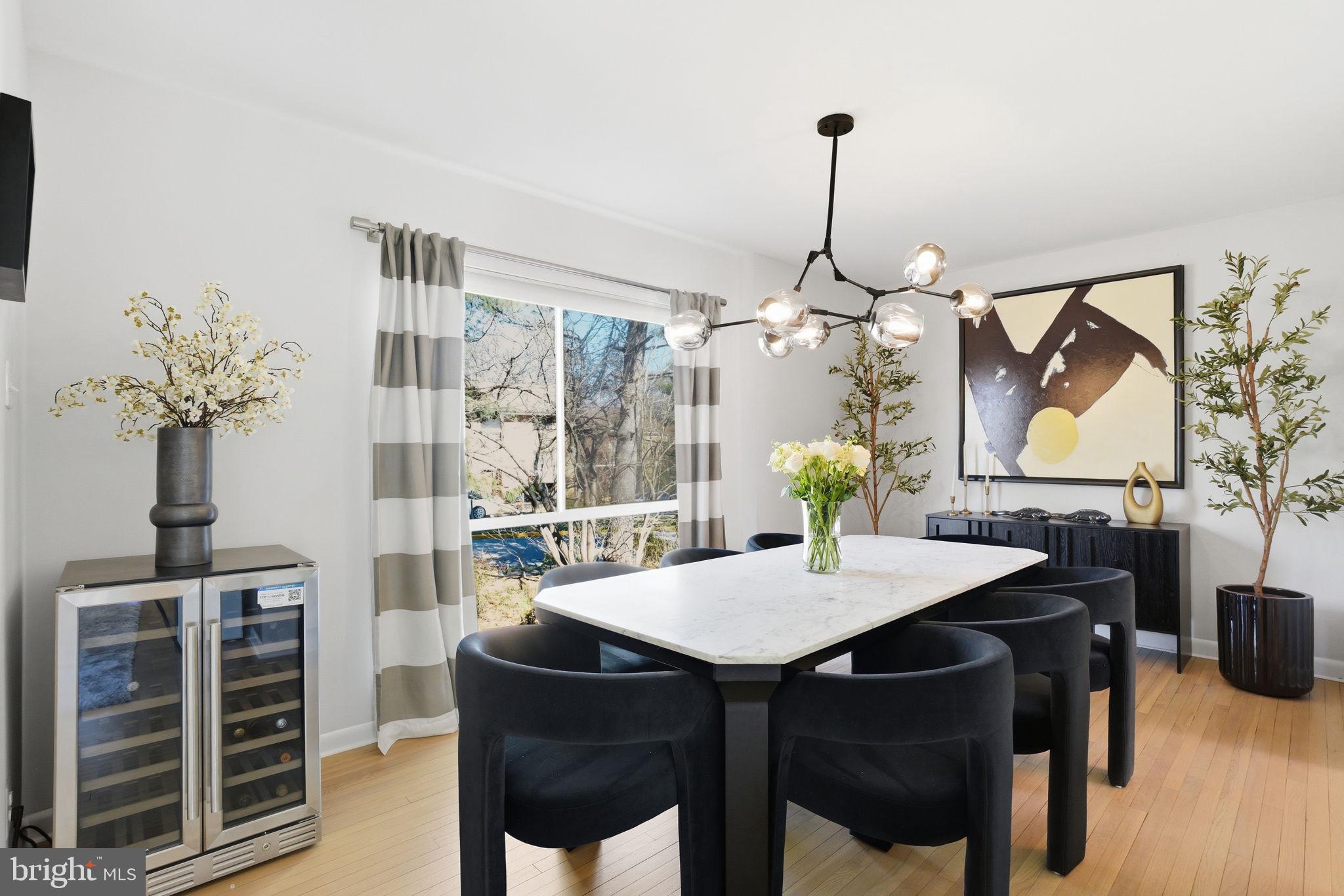 11025 Saffold Way Reston, VA 20190 - Photo 7 of 50 a dining room with furniture and window