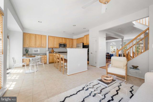 a table and chairs in a kitchen