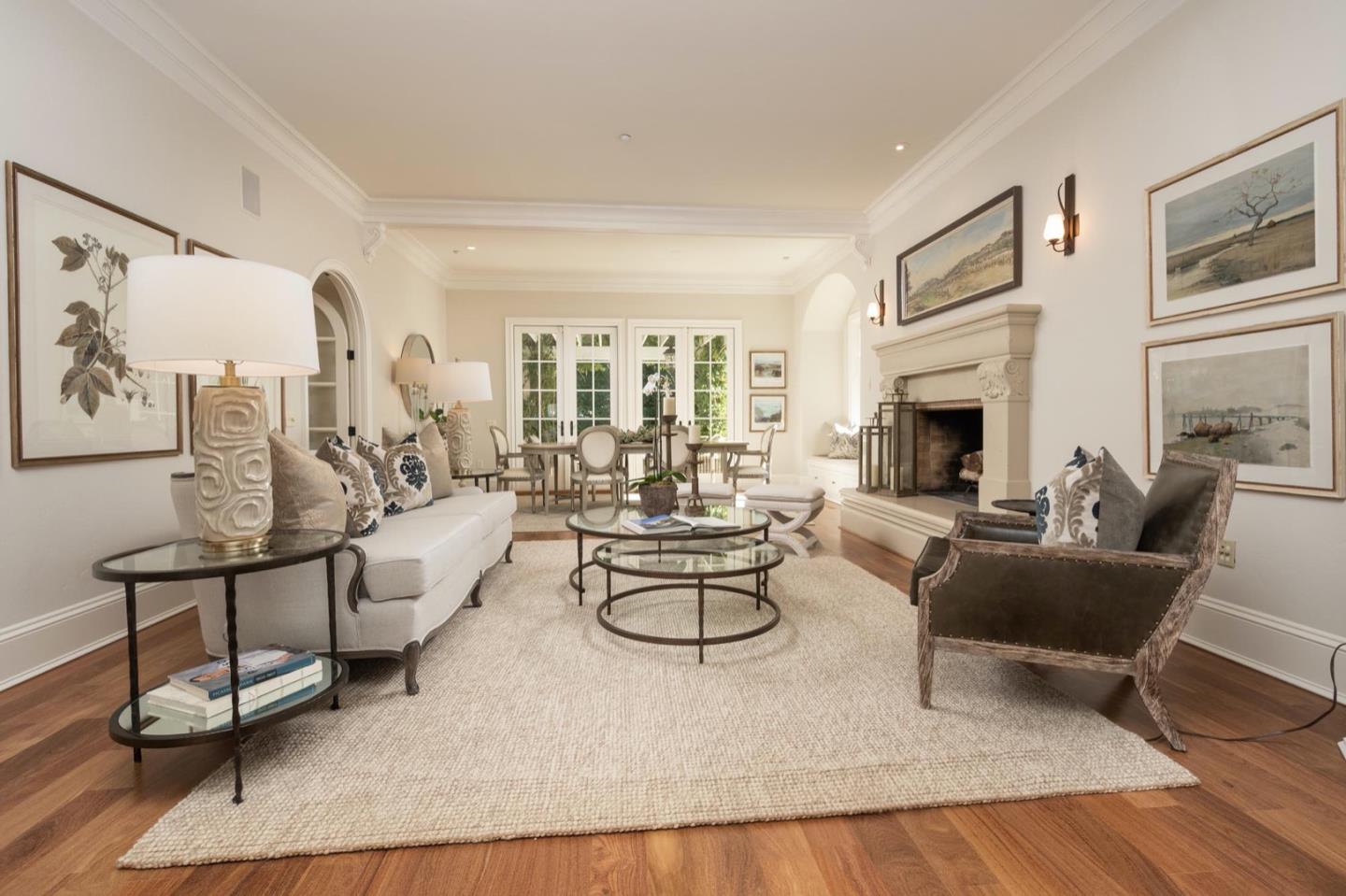521 Roehampton Road Hillsborough, CA 94010 - Photo 11 of 51 a living room with fireplace furniture and floor to ceiling window
