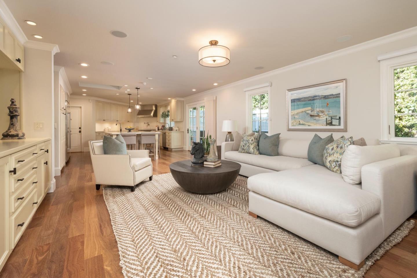 521 Roehampton Road Hillsborough, CA 94010 - Photo 22 of 51 a living room with furniture and white walls