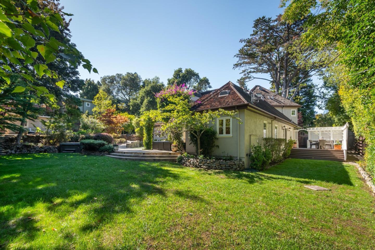 521 Roehampton Road Hillsborough, CA 94010 - Photo 42 of 51 a view of a house with a yard