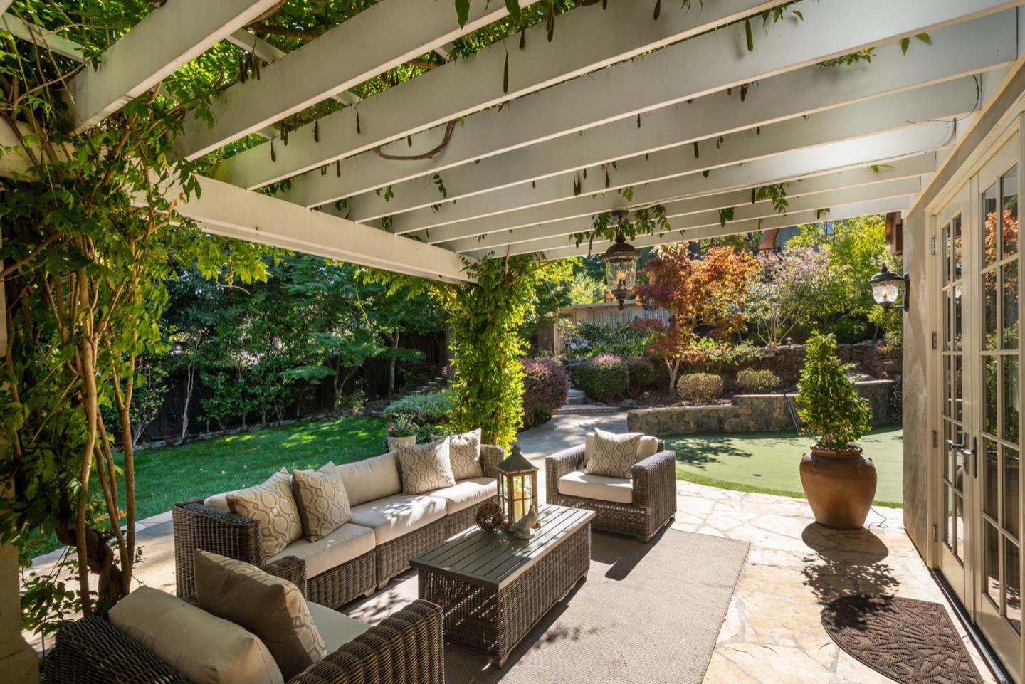 521 Roehampton Road Hillsborough, CA 94010 - Photo 46 of 51 a outdoor living space with patio furniture and garden view