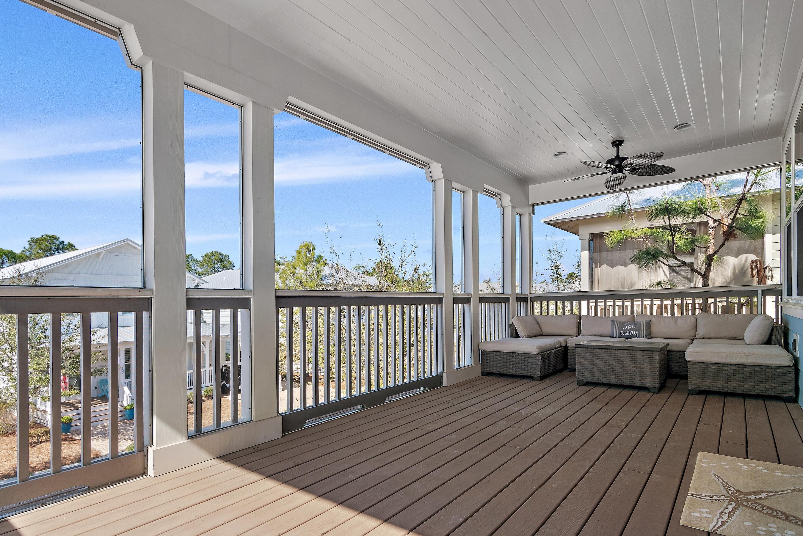 260 Flatwoods Forest Loop Santa Rosa Beach, FL 32459 - Photo 20 of 32 a view of balcony with couch