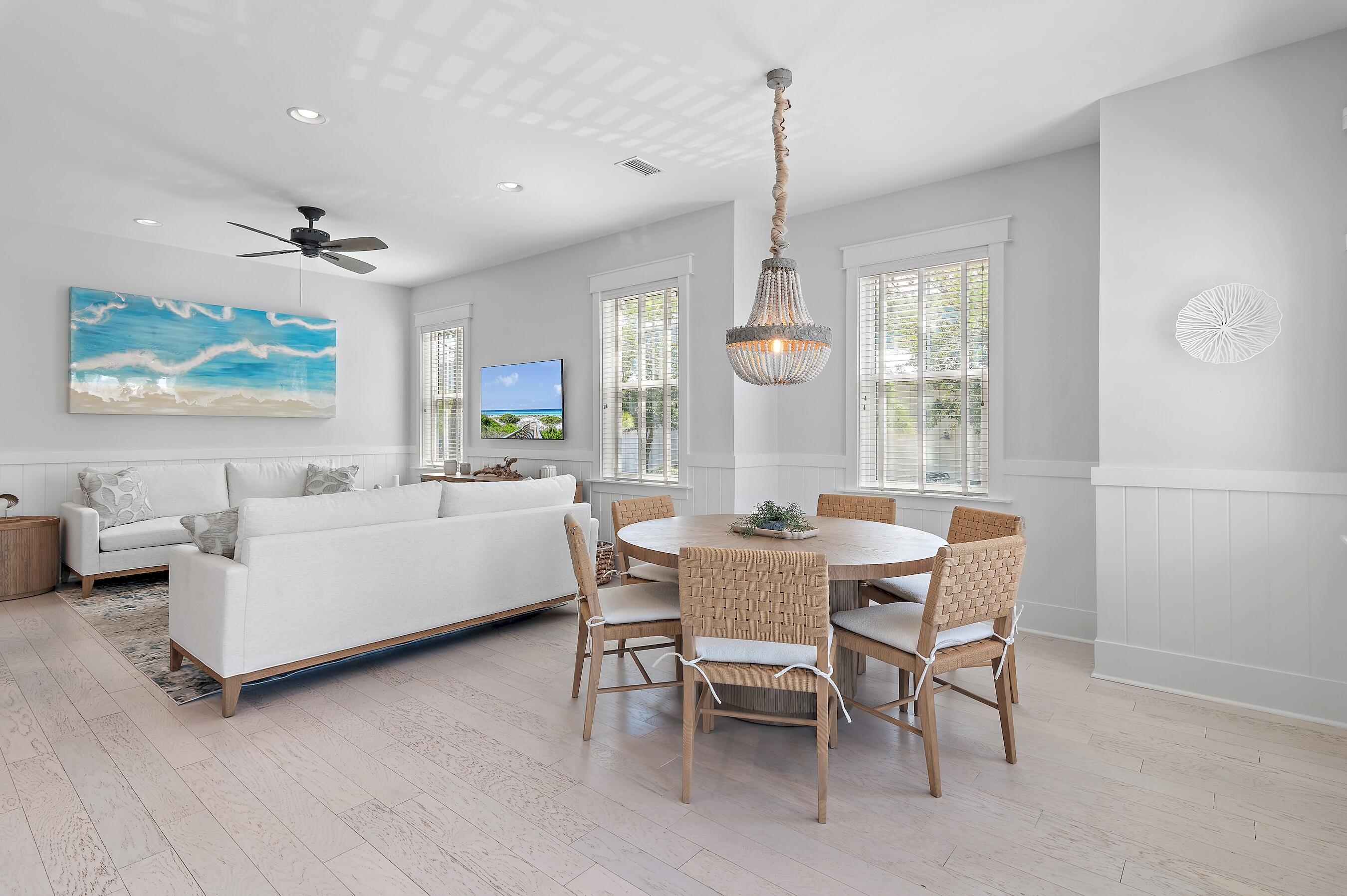 260 Flatwoods Forest Loop Santa Rosa Beach, FL 32459 - Photo 3 of 32 a view of a dining room with furniture window and outside view