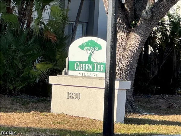 a sign on the side of a road