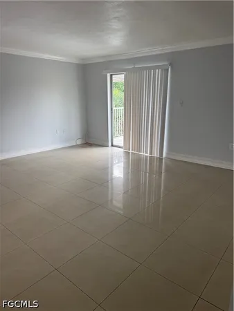 a view of balcony with wooden floor