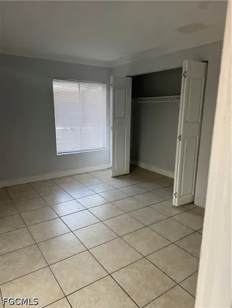 a kitchen with cabinets appliances a sink and a counter top