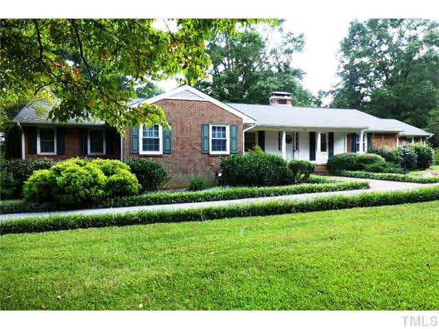 1555 Hanford Road Graham, NC 27253 - Photo 2 of 25 a front view of a house with a yard