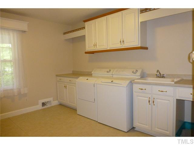 1555 Hanford Road Graham, NC 27253 - Photo 18 of 25 a utility room with a sink