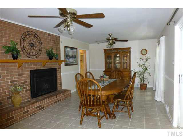 1555 Hanford Road Graham, NC 27253 - Photo 7 of 25 a view of a dining room with furniture