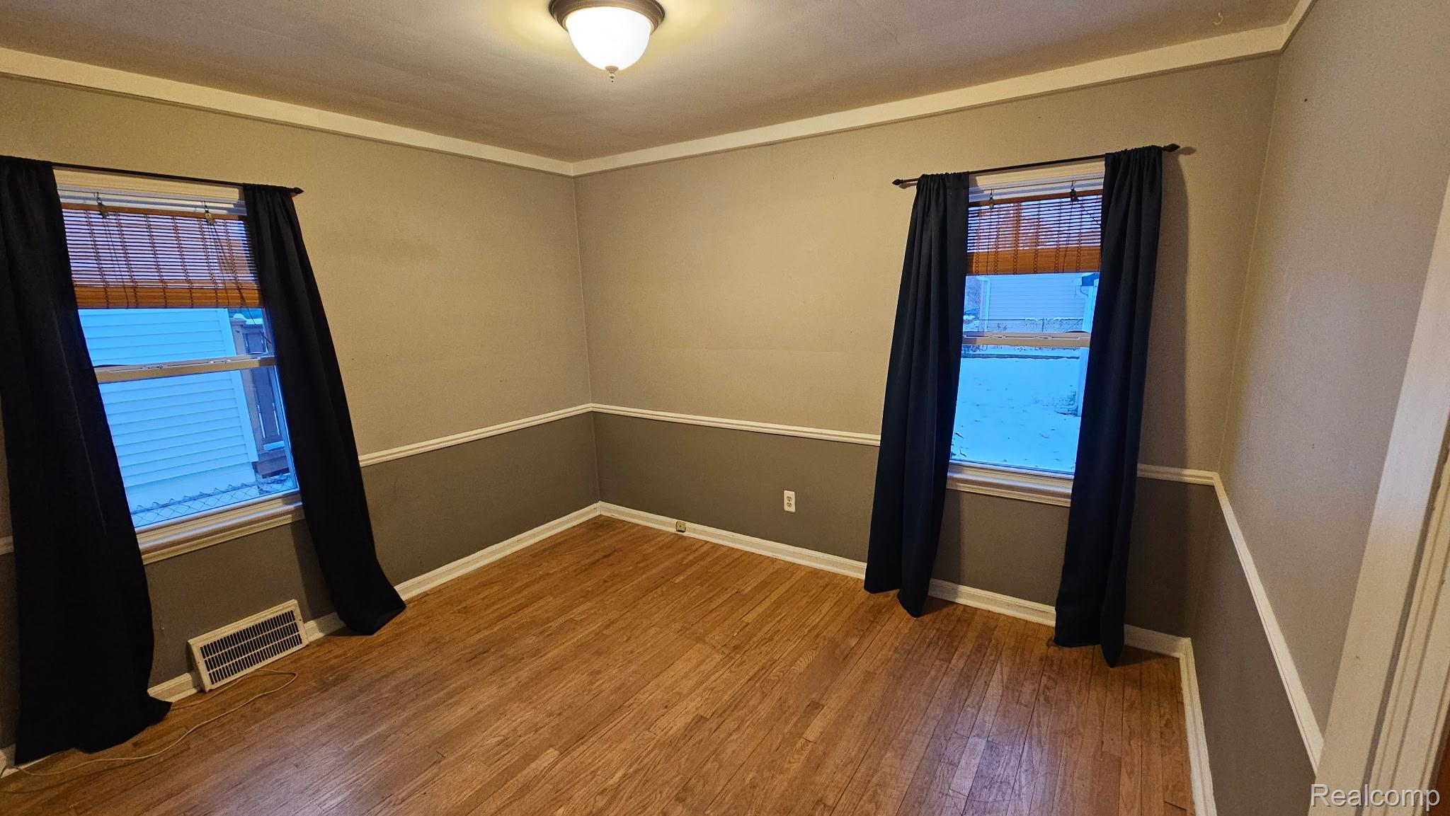 2259 Cambridge Road Berkley, MI 48072 - Photo 8 of 20 Spare room featuring light wood-style flooring and baseboards
