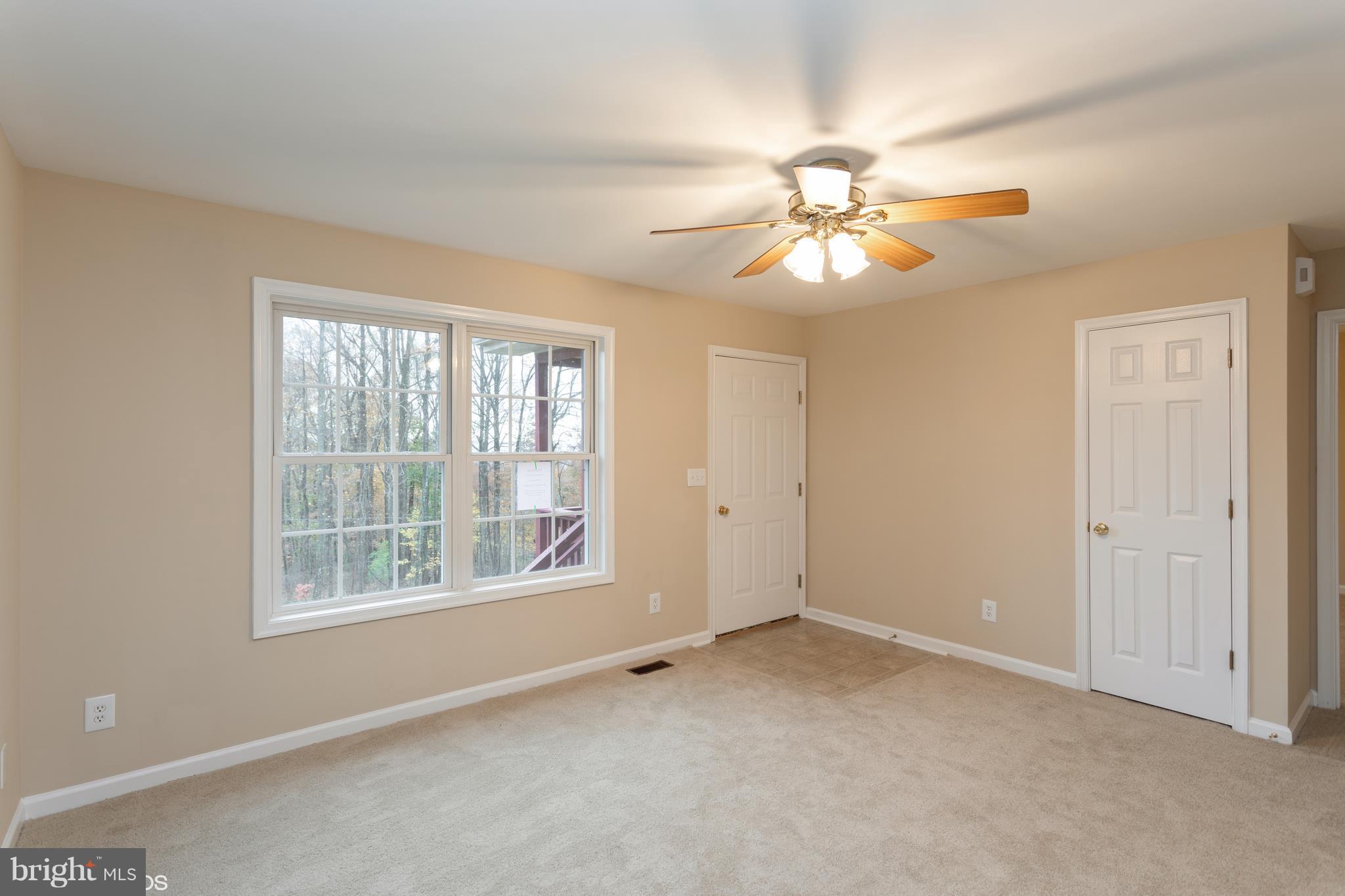 322 Freeze Road Linden, VA 22642 - Photo 12 of 26 a view of an empty room with a window