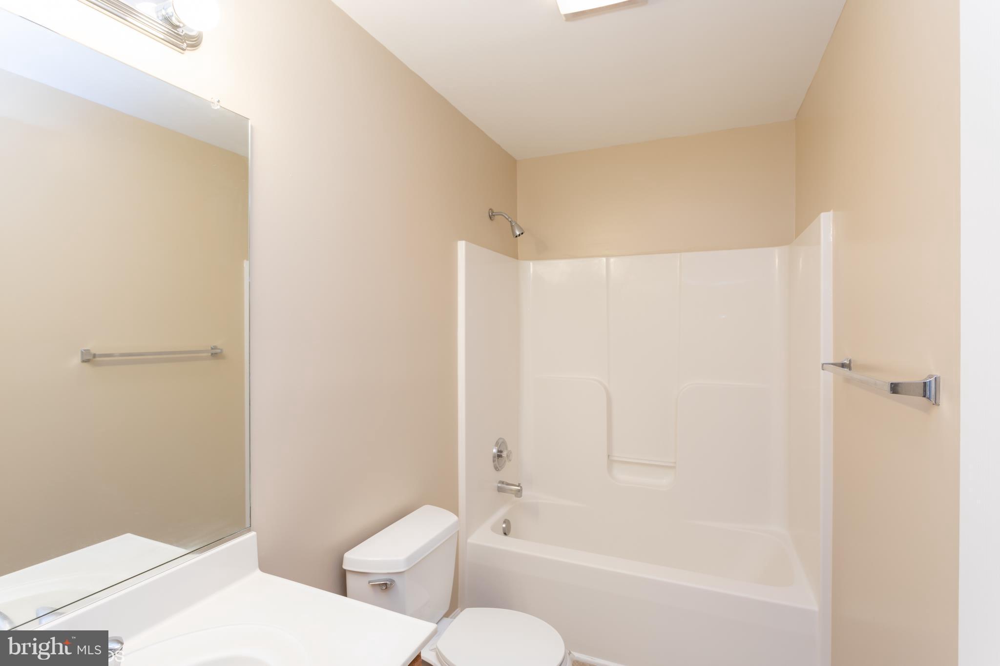 322 Freeze Road Linden, VA 22642 - Photo 20 of 26 a bathroom with a toilet and a shower