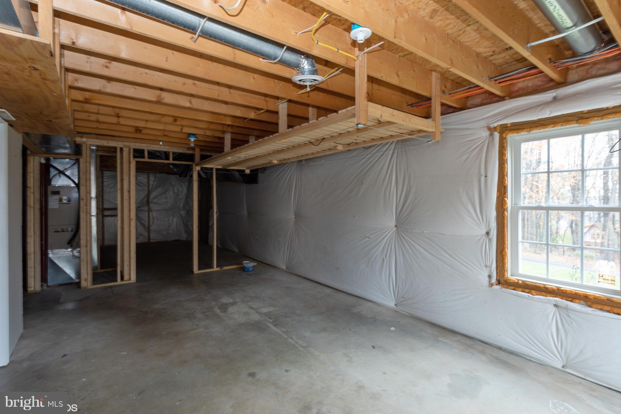 322 Freeze Road Linden, VA 22642 - Photo 21 of 26 a view of an empty room with a window