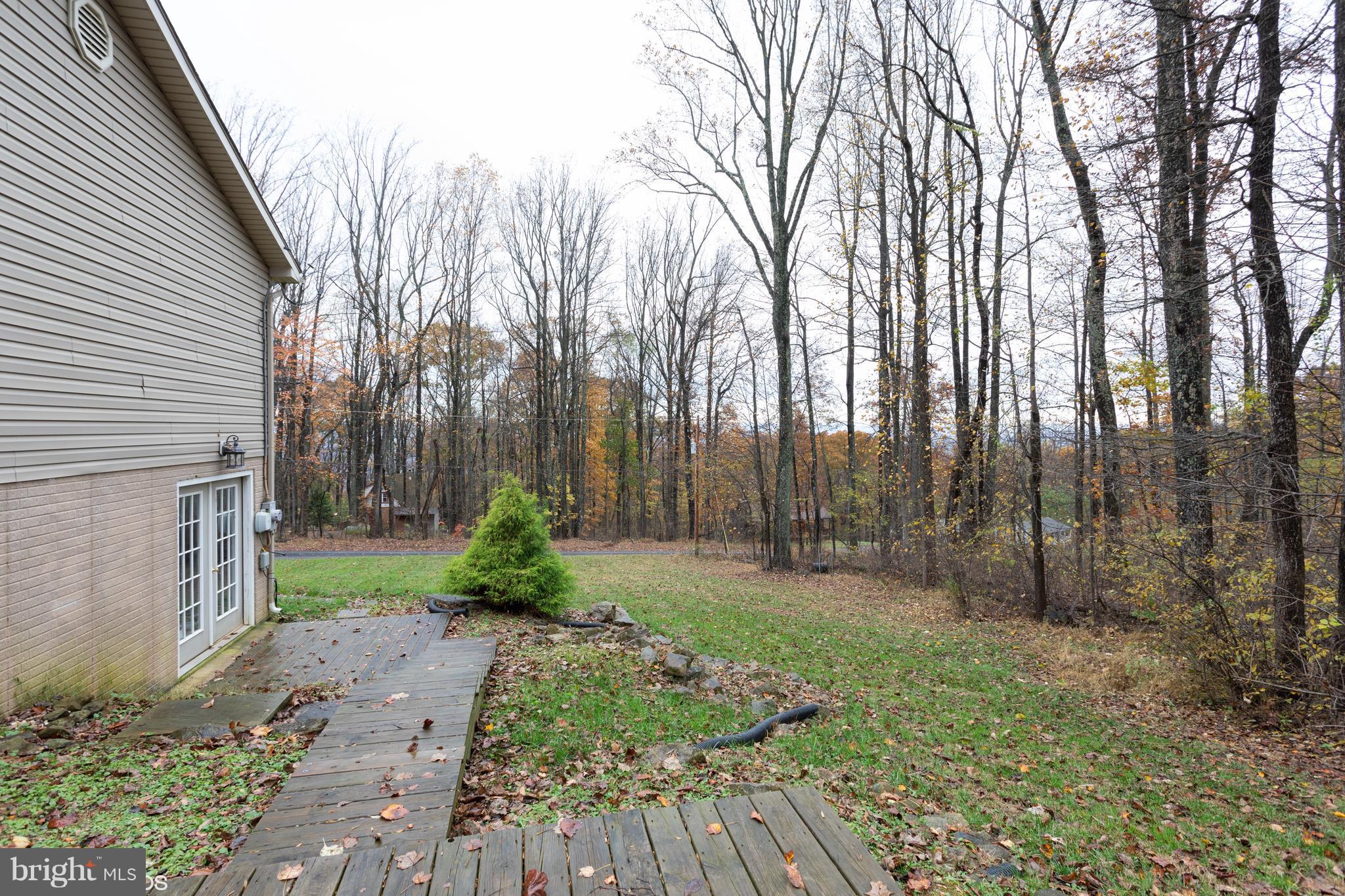 322 Freeze Road Linden, VA 22642 - Photo 23 of 26 a backyard of a house with lots of green space