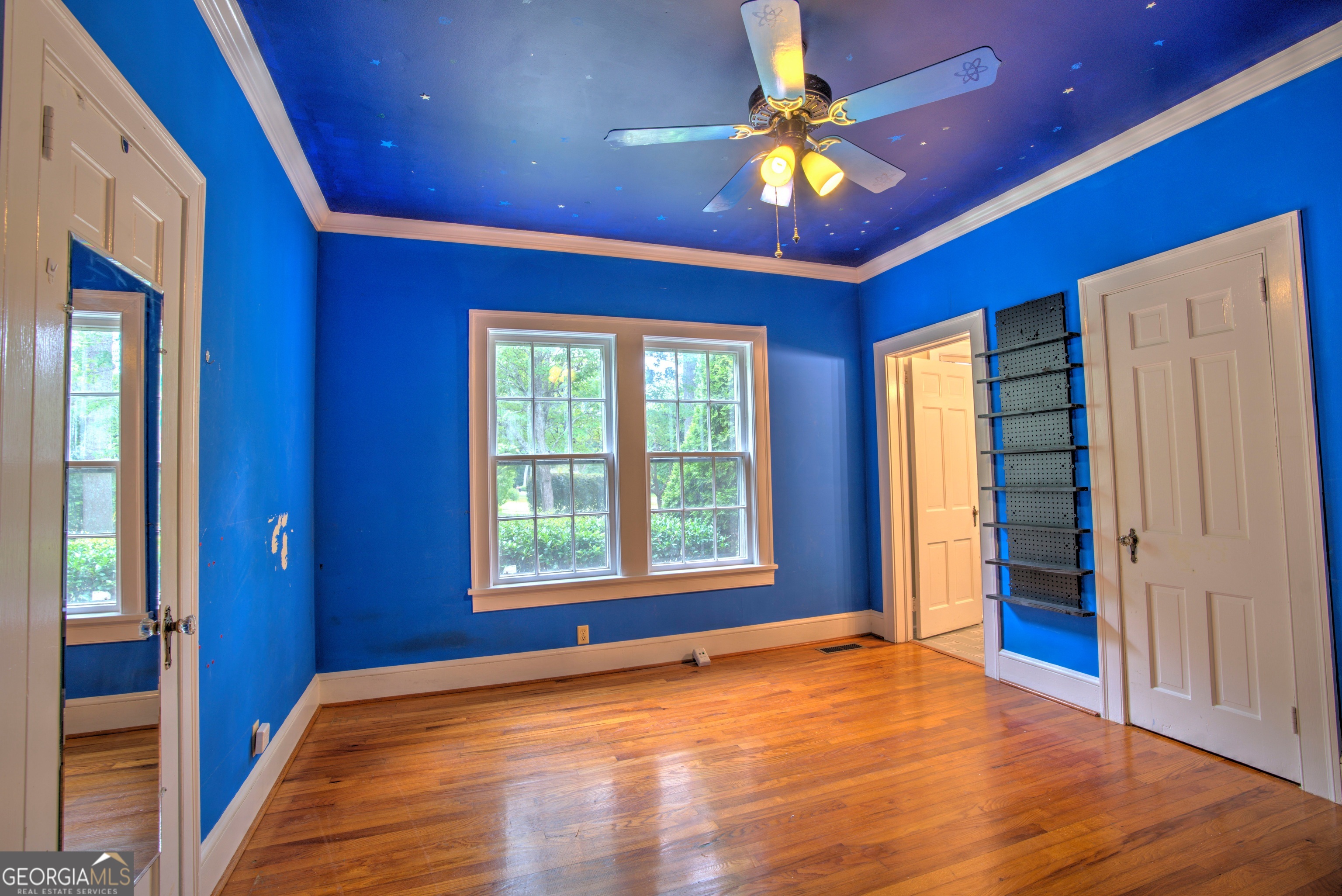 19 Berckmans Lane Southwest Rome, GA 30165 - Photo 15 of 26 a view of an empty room with a window and a chandelier