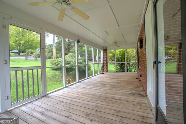 a view of backyard with green space