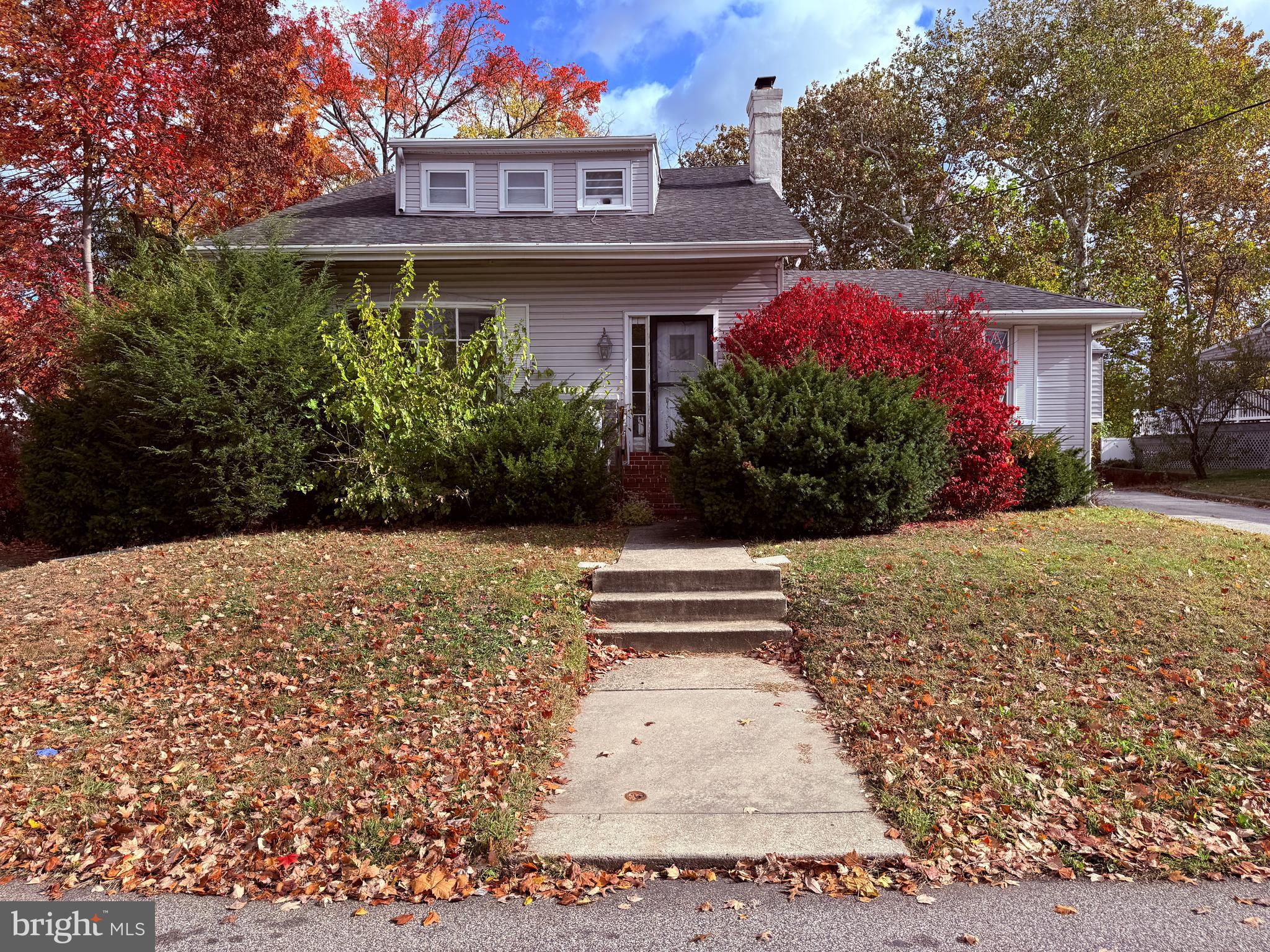 328 Hutchinson Terrace, Unit A Holmes, PA 19043 - Photo 1 of 27 a front view of a house with a yard