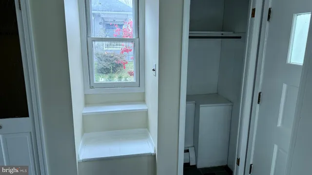 a bathroom with a bathtub and toilet