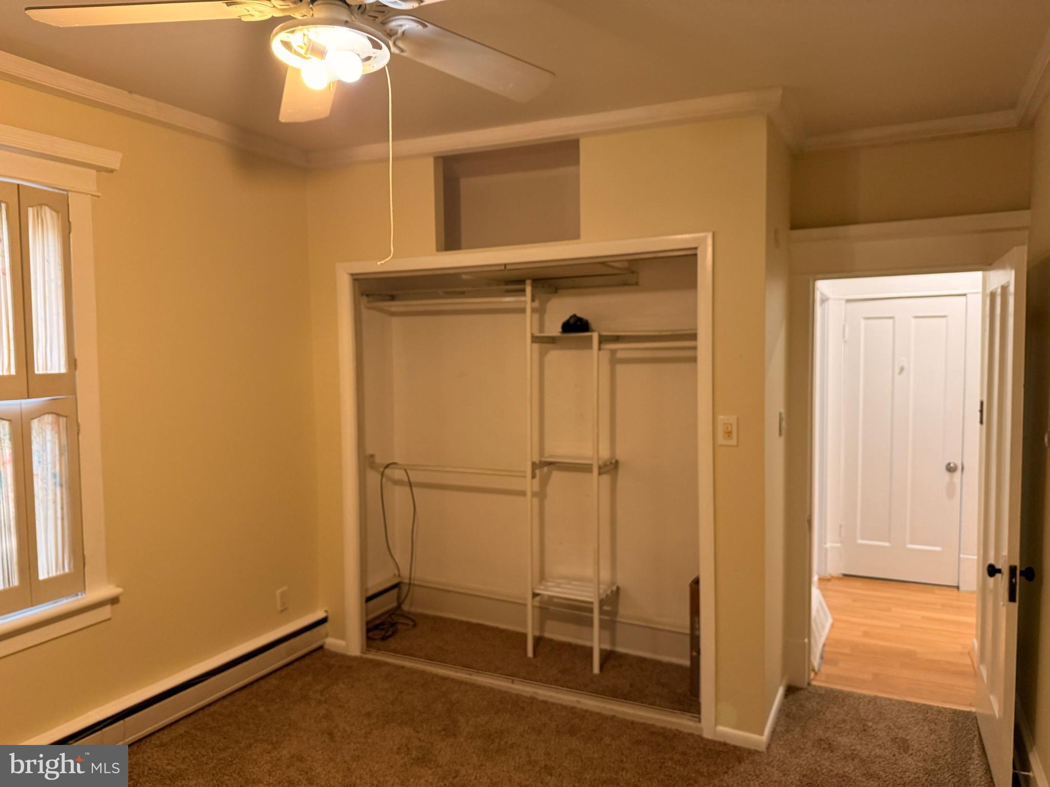 328 Hutchinson Terrace, Unit A Holmes, PA 19043 - Photo 21 of 27 a view of a room with wooden door