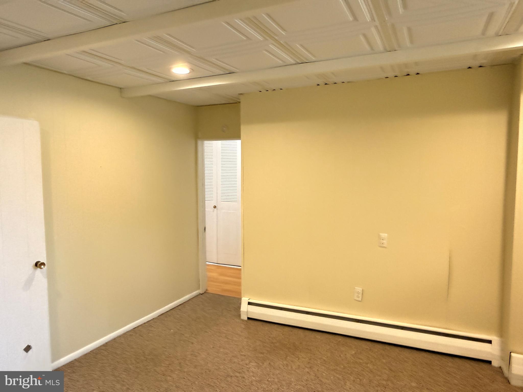 328 Hutchinson Terrace, Unit A Holmes, PA 19043 - Photo 23 of 27 a view of an empty room