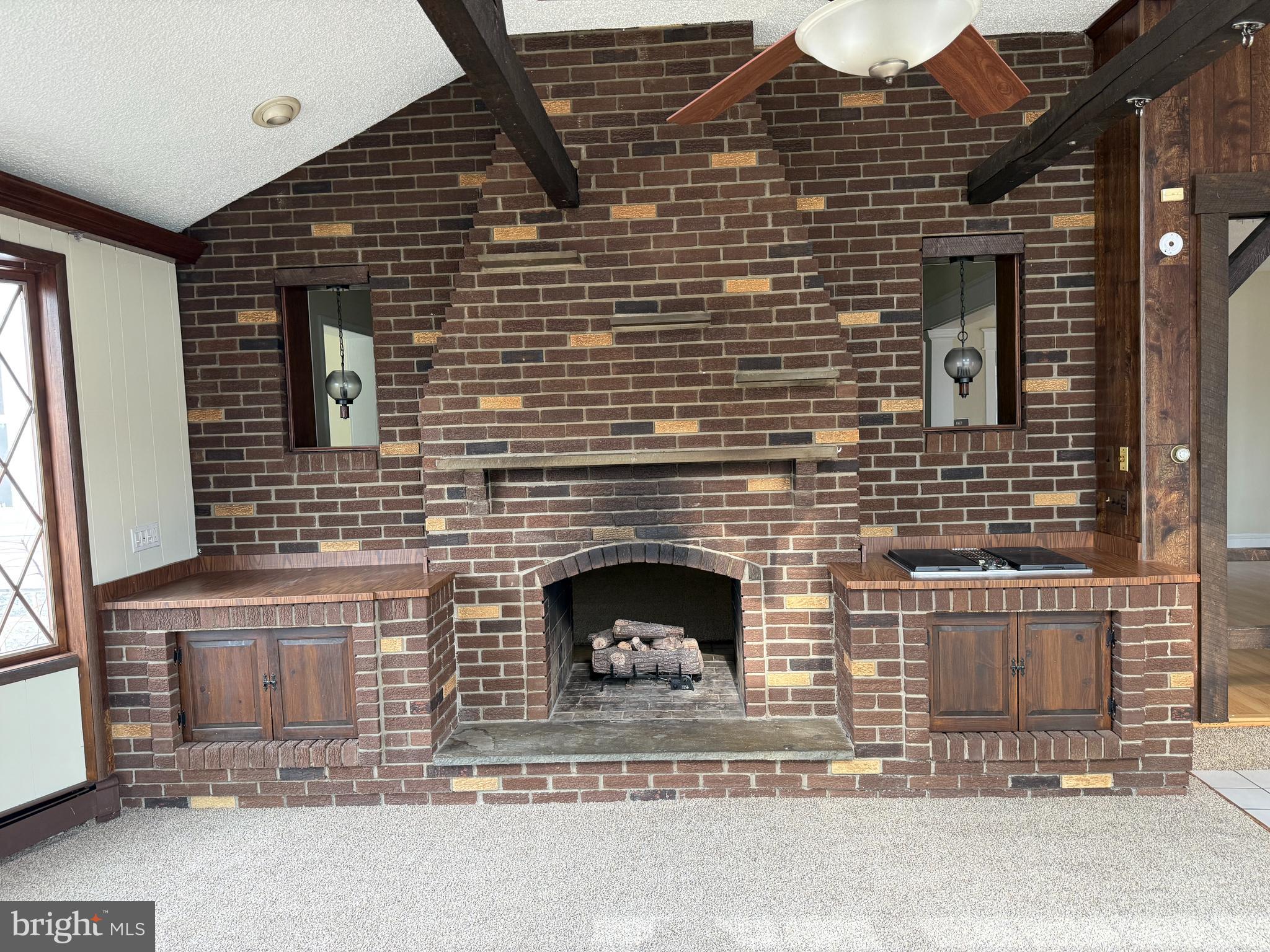 328 Hutchinson Terrace, Unit A Holmes, PA 19043 - Photo 5 of 27 a brick house with a door