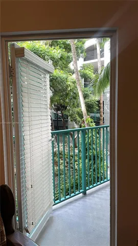 a view of a house with a small yard