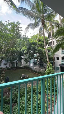 a view of a yard in front of a house