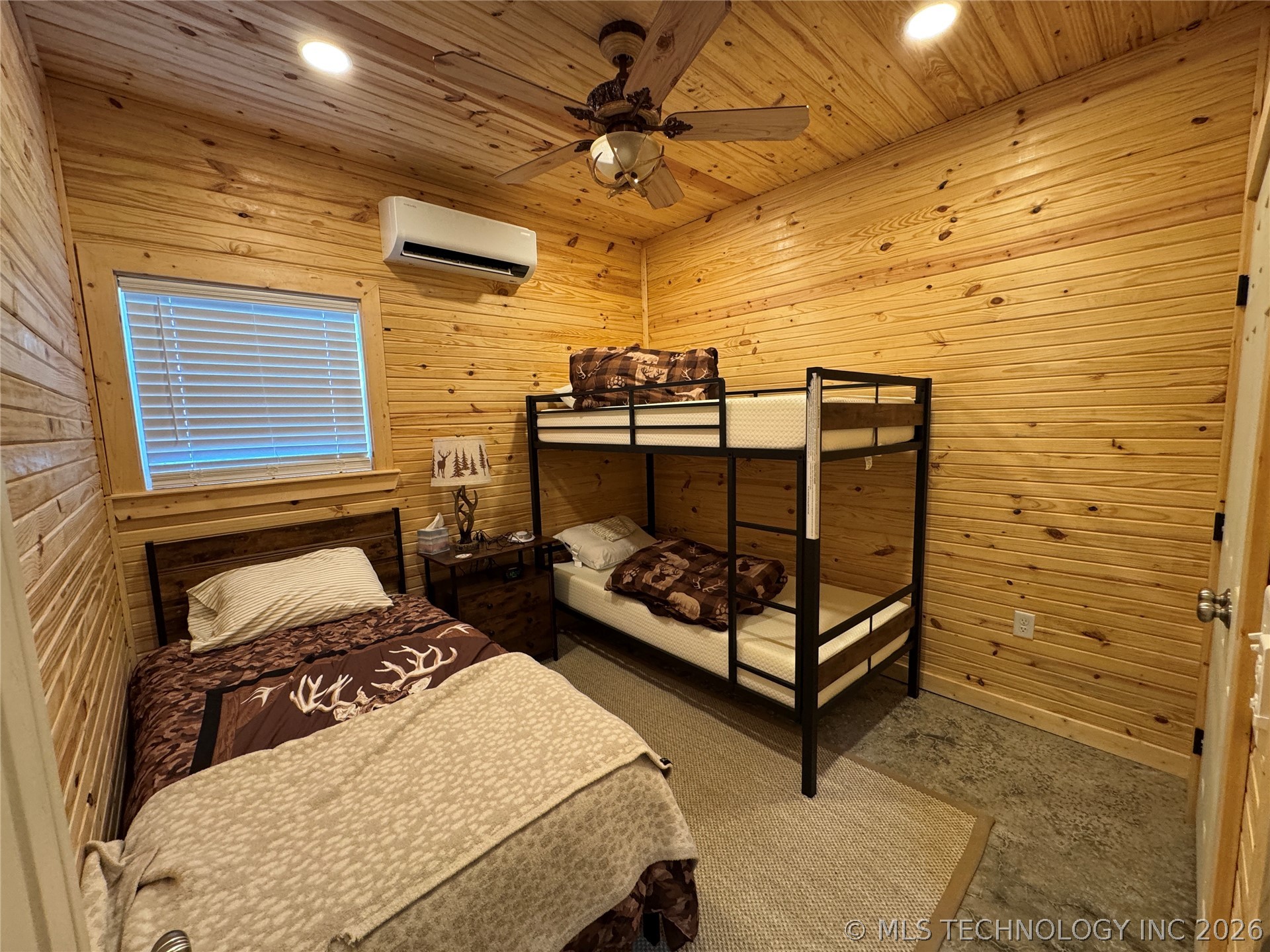 20862 East 1160th Road Keota, OK 74941 - Photo 27 of 47 Interior room featuring natural wood plank walls and ceiling, a window with horizontal blinds, recessed lighting, and a ceiling fan with integrated light