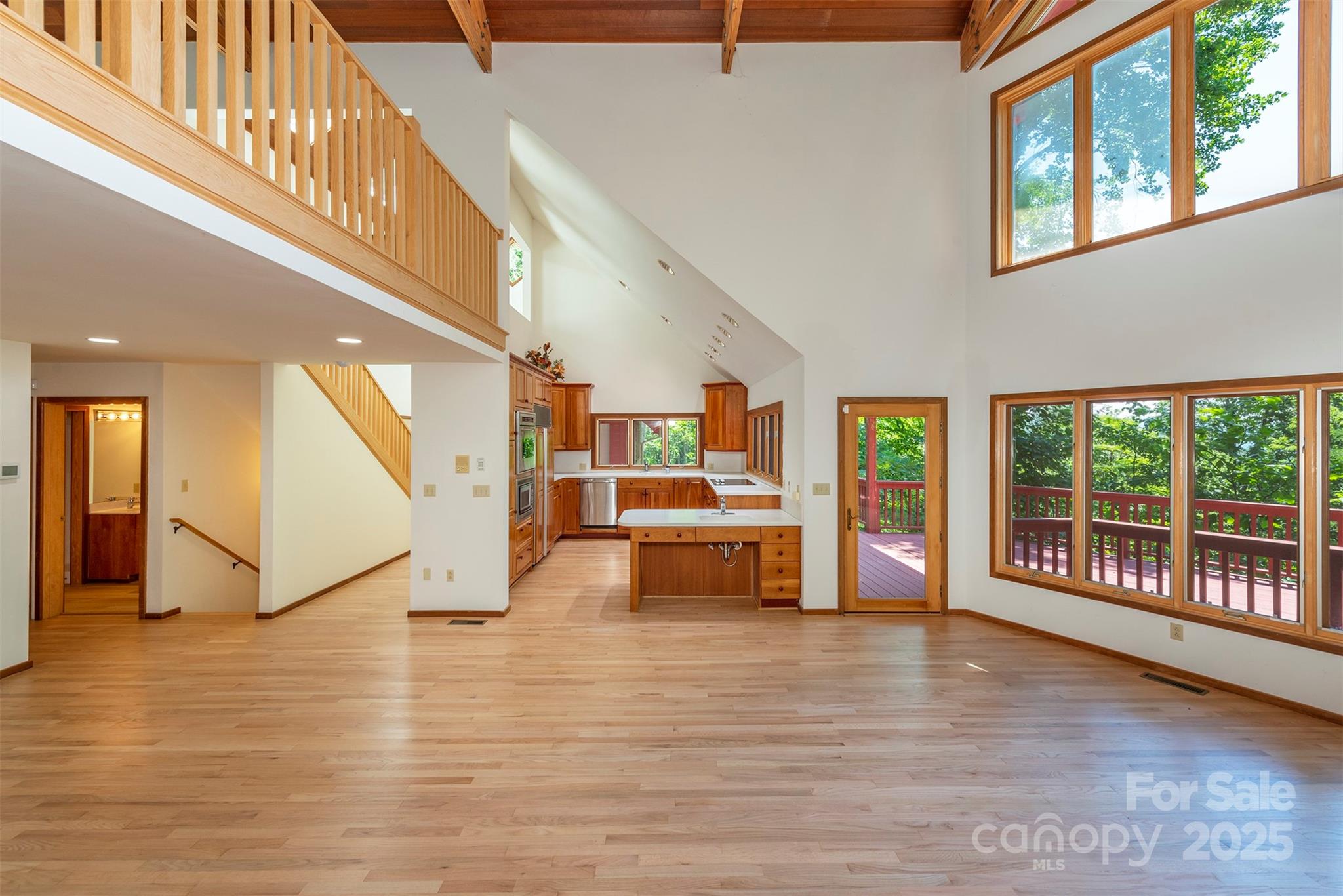 7 Winding Poplar Road Black Mountain, NC 28711 - Photo 11 of 48 a view of an entryway with wooden floor and windows