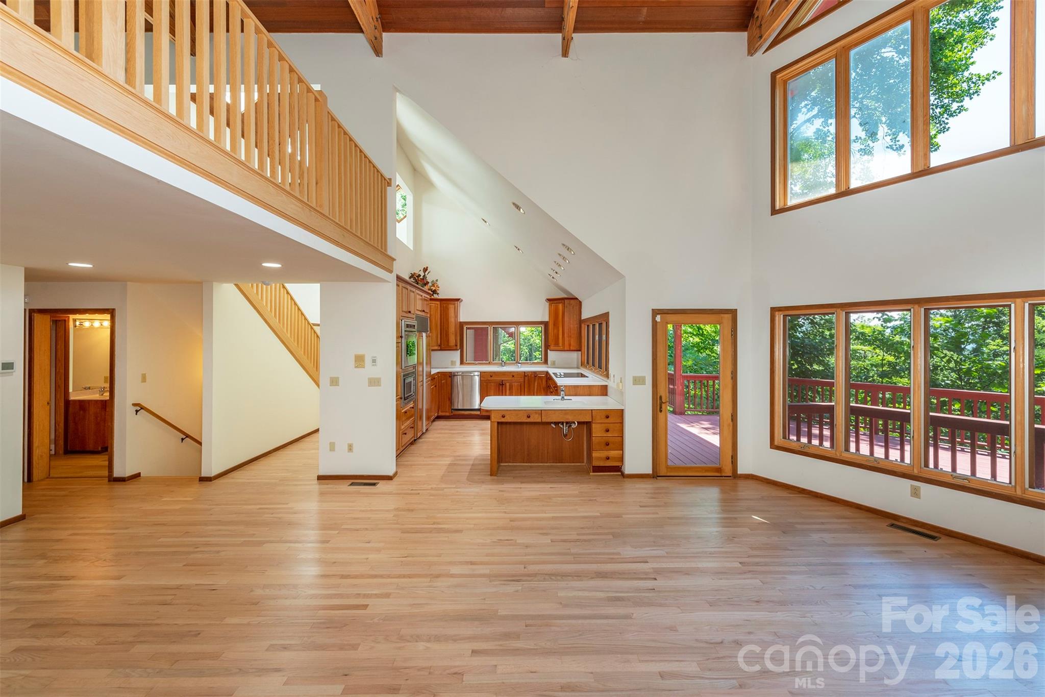 7 Winding Poplar Road Black Mountain, NC 28711 - Photo 11 of 48 a view of an entryway with wooden floor and windows