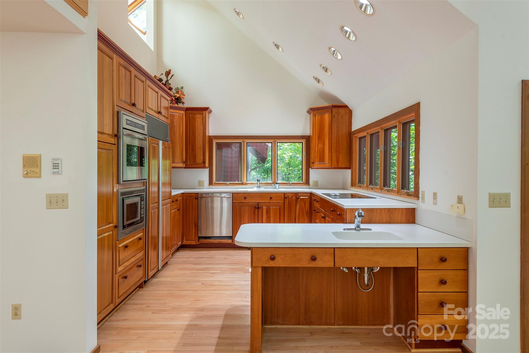 7 Winding Poplar Road Black Mountain, NC 28711 - Photo 15 of 48 a view of a kitchen with cabinets