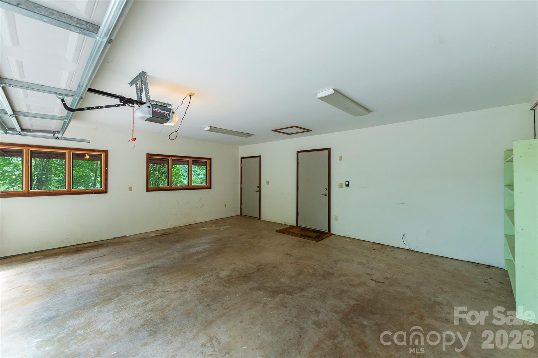 7 Winding Poplar Road Black Mountain, NC 28711 - Photo 41 of 48 an empty room with windows