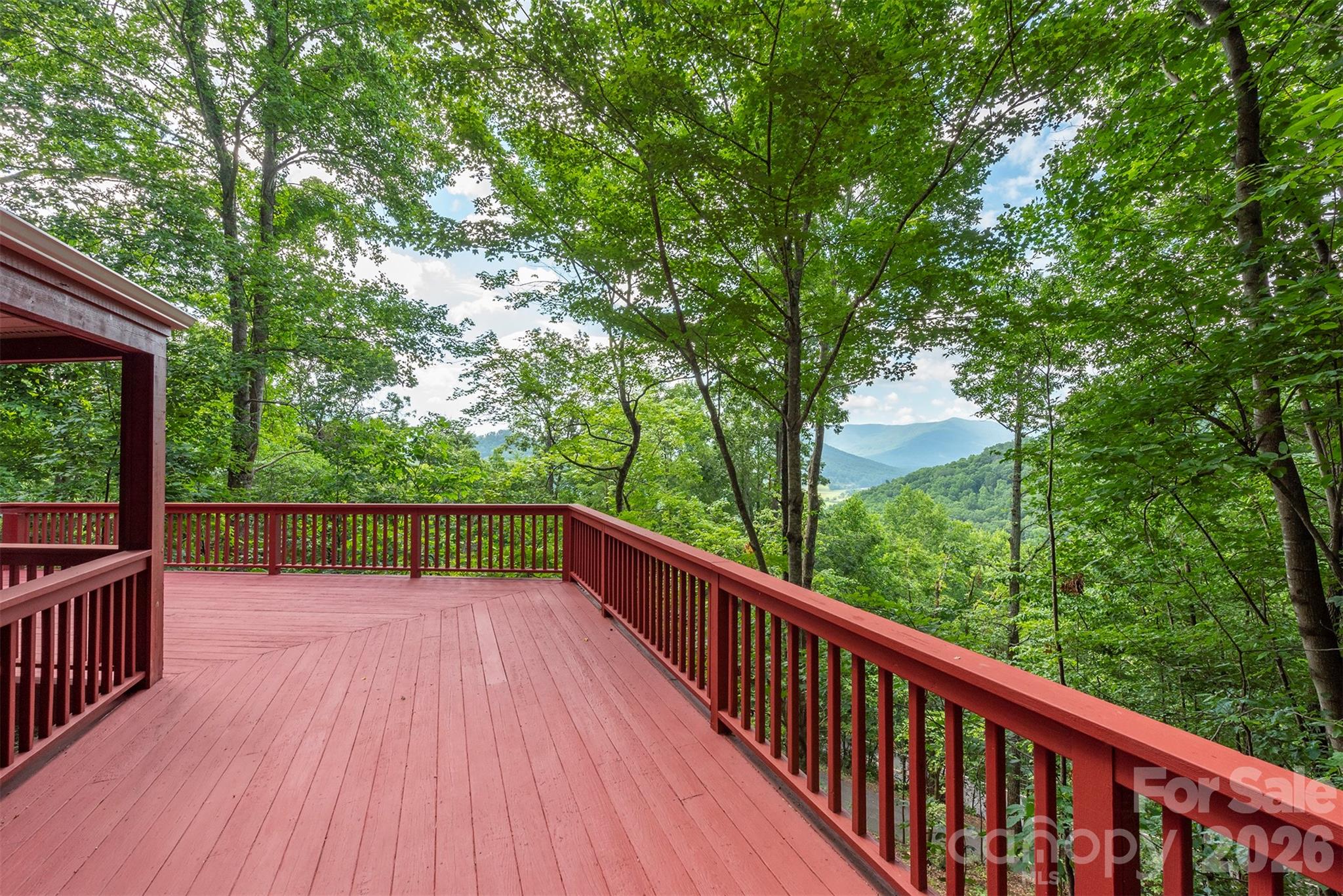 7 Winding Poplar Road Black Mountain, NC 28711 - Photo 48 of 48 a balcony with an outdoor space