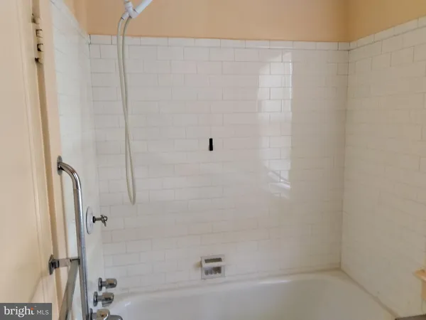 a bathroom with a bathtub