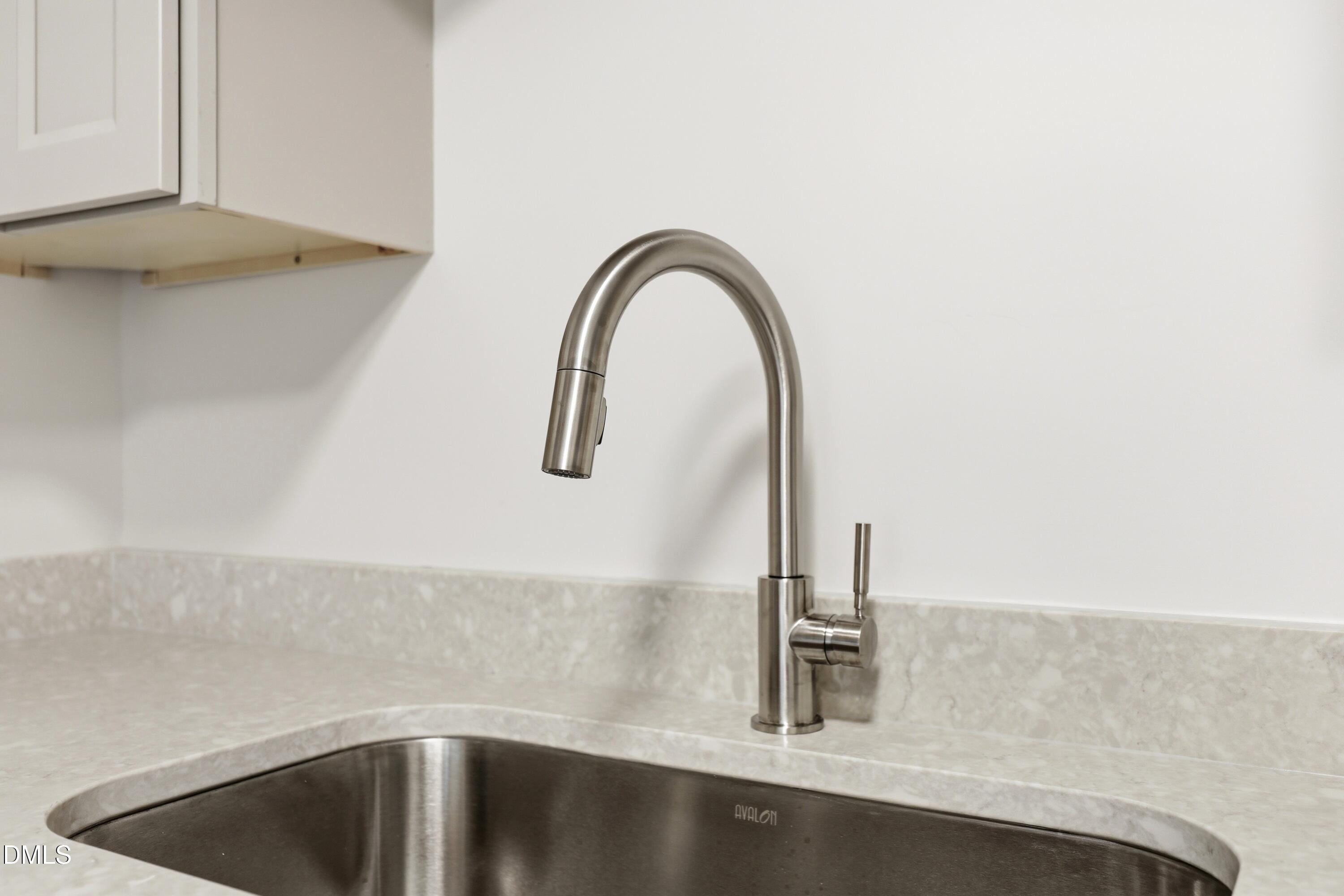 669 Bashford Road Raleigh, NC 27606 - Photo 5 of 19 a close view of sink and tap