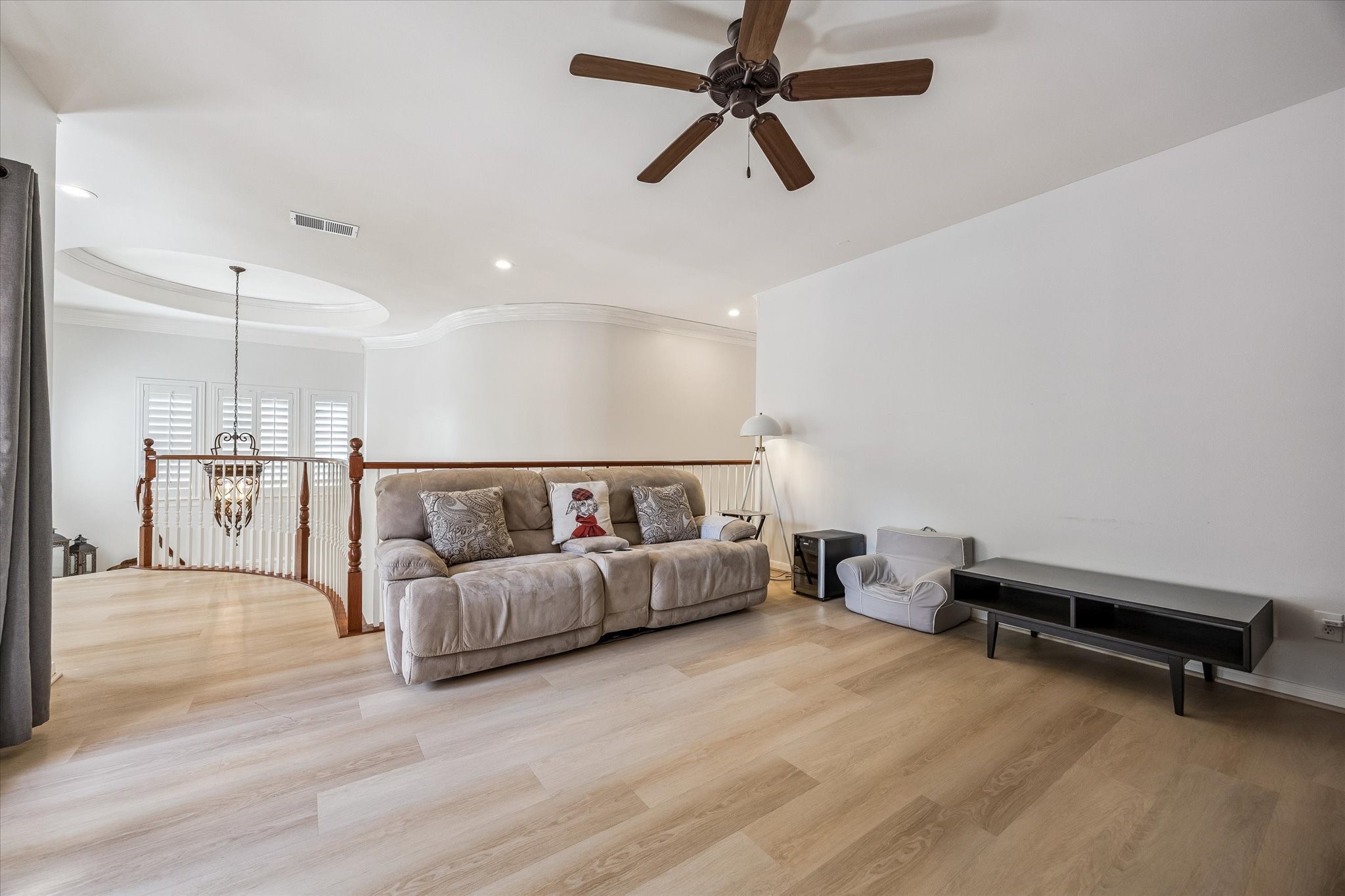 3047 Bonnebridge Way Boulevard Houston, TX 77082 - Photo 42 of 50 Spacious second-floor landing featuring a versatile game room with beautiful wood flooring. Upstairs offers two bedrooms and a shared bathroom.