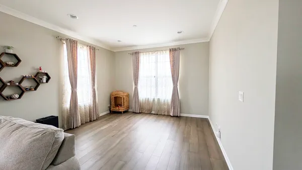 a view of livingroom with window and hardwood floor
