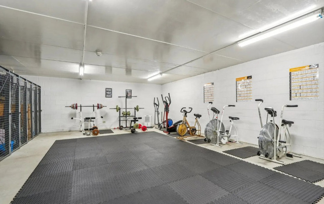 1S095 Spring Road, Unit 1D Oakbrook Terrace, IL 60181 - Photo 24 of 26 a view of a room with gym equipment